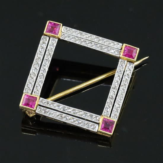 A mid 20th century gold, ruby and diamond square openwork brooch, 21mm.